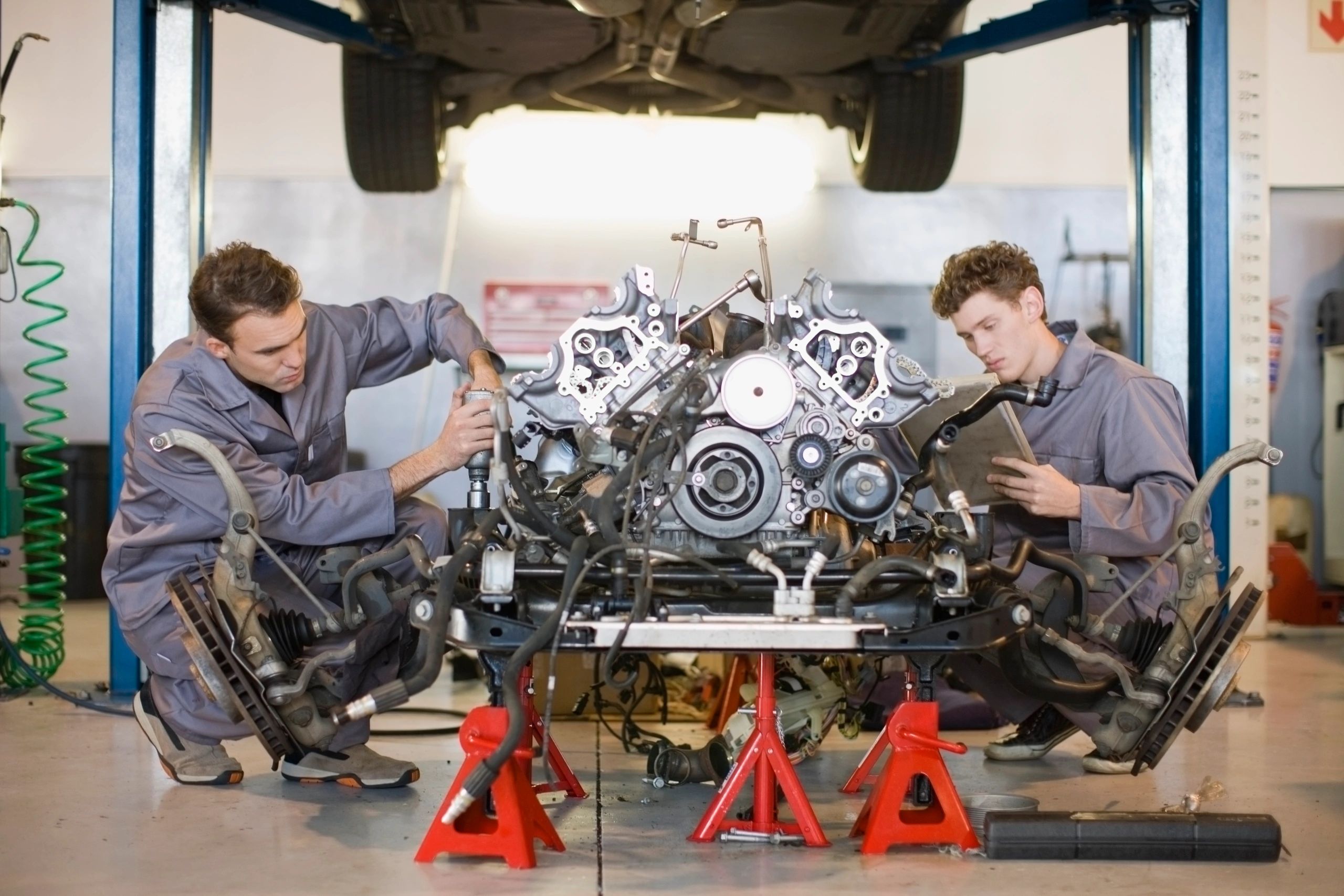 Team of mechanics in auto repair shop