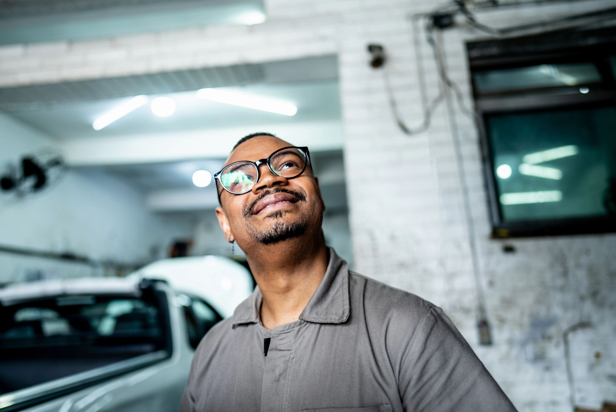 Satisfied car owner at repair shop